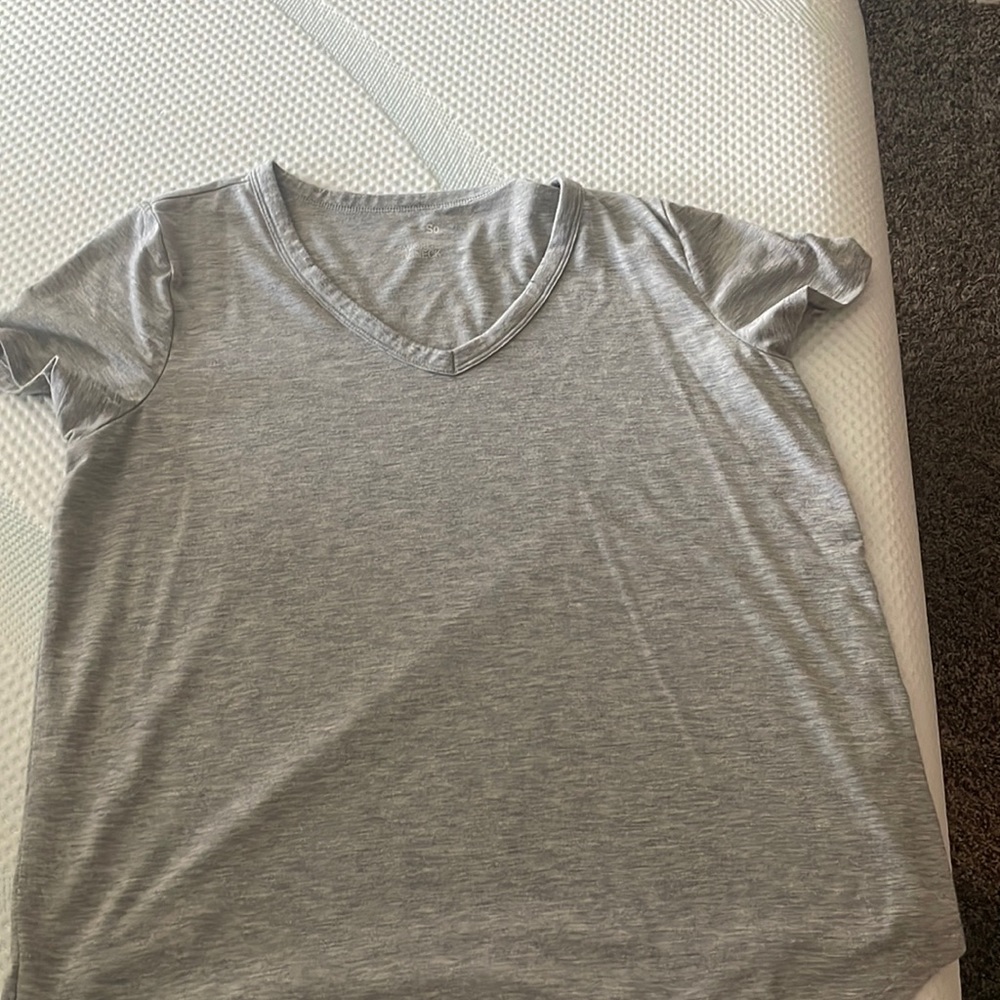 Grey v-neck tshirt. Wore a few times. No stains